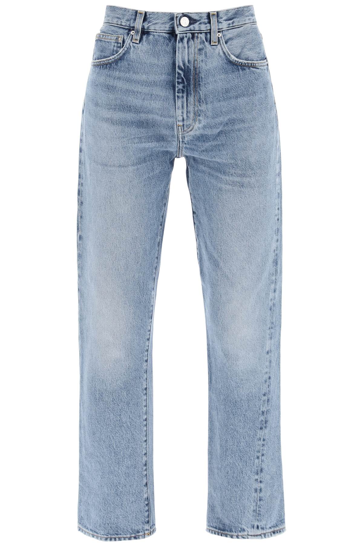 Shop Totême Twisted Seam Cropped Jeans In Blue